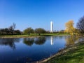 Bright spring day in park in MalmÃÂ¶ Sweden with reflections of skyscraper in pond water
