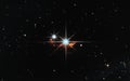Bright Star with Nebula and Diffraction Spikes in Dark Space