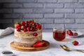 Bright summer cake with fresh berries on the table Royalty Free Stock Photo