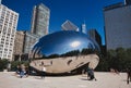 Bright summer day at Millennium Park in Chicago, Illinois with the famous Bean sculpture in the back