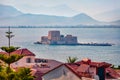 Bright summer view of Bourtzi Castle. Splendid morning cityscape of Nafplion town. Royalty Free Stock Photo