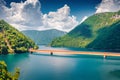 Bright summer view of Pivsko lake with bridge.