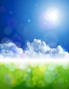 Bright sun, clear skies, clouds, green grass Royalty Free Stock Photo