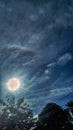 Bright Sun and Dramatic Cloud Formation in Deep Blue Sky Royalty Free Stock Photo