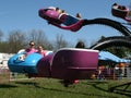 Thrill-seekers enjoy a ride at a local traveling show