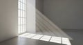 Bright sunlight streams through large window creating geometric shadows in empty room Royalty Free Stock Photo