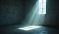 Bright sunlight streams through a window into a dark room. The light creates dramatic shadows on the wall and floor. Conceptual Royalty Free Stock Photo