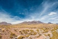 Bright sunny day on volcanos of Atacama Desert. Mountains southern from San Pedro de Atacama. Stunning scenery in bright sunlight Royalty Free Stock Photo