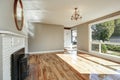 Bright sunny empty living room and entryway interior