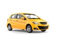 Bright sunny yellow modern compact car Royalty Free Stock Photo