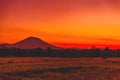 Bright sunrise at rise terraces and volcano Agung in Bali