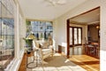 Bright sunroom with antique chair Royalty Free Stock Photo