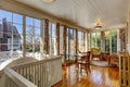 Bright sunroom with wicker furniture