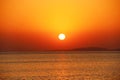 Bright sunset above sea. Beautiful red summer decline above ocean Royalty Free Stock Photo