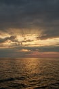 Bright sunset on the Baltic Sea coast upright photo Royalty Free Stock Photo