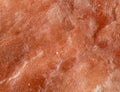 Bright surface texture of Himalayan salt block macro shot Royalty Free Stock Photo