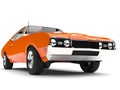 Bright tangerine orange old school muscle car - front view closeup shot Royalty Free Stock Photo