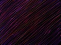 Diagonal colored lines with predominantly purple on a black background. Purple abstract rain - illustration. Royalty Free Stock Photo