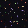 Bright tiny confetti falling on black