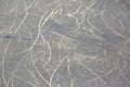 Bright traces of ice skating on an ice rink. background and texture Royalty Free Stock Photo
