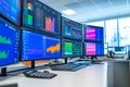 Bright trading area features multiple monitors showcasing colorful graphs and statistics, reflecting real-time financial Royalty Free Stock Photo
