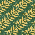 Bright tropical branch leaves seamless pattern. Hand drawn orange foliage on green background with dots Royalty Free Stock Photo