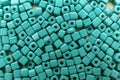 Bright turquoise beads as background, top view Royalty Free Stock Photo