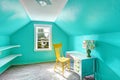 Bright turquoise room with desk and chair