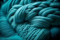 Bright turquoise woolen threads. Brains from yarn macro view knitting hobby needlework. Handmade natural rope skein warm