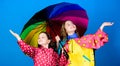 Bright umbrella. It is easier to be happy together. Be rainbow in someones cloud. Walk under umbrella. Kids girls happy