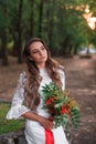 Bright unusual elegant autumn bouquet in hands of the bride Royalty Free Stock Photo