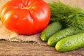 Bright vegetables on a wooden cracked board