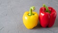 Bright vegetables Yellow and red bellpeppers Water drops on washed peppers. Light background Appetizing raw ripe peppers Royalty Free Stock Photo