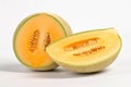 A bright and vibrant stock photo of fresh Cantaloupes on a pristine white background Royalty Free Stock Photo