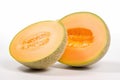 A bright and vibrant stock photo of fresh Cantaloupes on a pristine white background Royalty Free Stock Photo