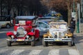 Bright vintage excursion cars on Parizska street near Old Town Square in Prague, Czech Republic Royalty Free Stock Photo