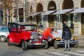 Bright vintage excursion cars on Parizska street near Old Town Square in Prague, Czech Republic Royalty Free Stock Photo