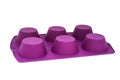 Bright violet silicone muffin pan isolated