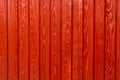 wall made of wooden boards natural wood pine painted in bright red Royalty Free Stock Photo