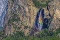 Bright waterfall rainbow from Artist Point Trail in Yosemite national park