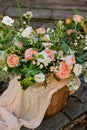 bright wedding bouquet of summer Alstroemeria and roses David Austin stands on a wooden gift shop