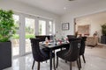 Bright well lit dining area in staged new home