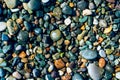 Bright wet pebble beach multi colored horizontal background Royalty Free Stock Photo