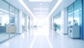 Bright white and blue hospital corridor with large windows and soft natural light Royalty Free Stock Photo