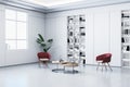 Bright concrete interior with shelves, coffee table, chairs and other objetcs. 3D Rendering Royalty Free Stock Photo