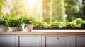 Bright white kitchen with wooden table top on blur window background, perfect for a cozy dining area Royalty Free Stock Photo