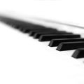 Bright White Piano Keys on Old Piano Close up High Toned Panoramic Royalty Free Stock Photo