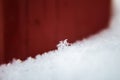 A single snowflake with a red background Royalty Free Stock Photo