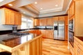 Bright wood kitchen with coffered ceiling Royalty Free Stock Photo