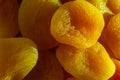 Bright yellow apricots halves. Close up.